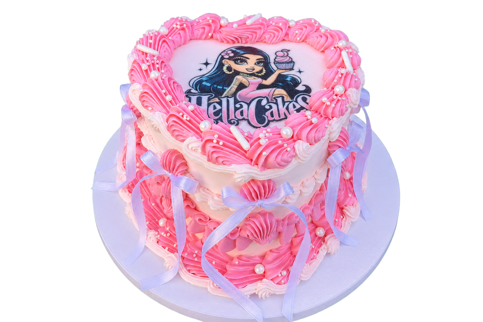 Pink heart-shaped Hella Cakes signature cake