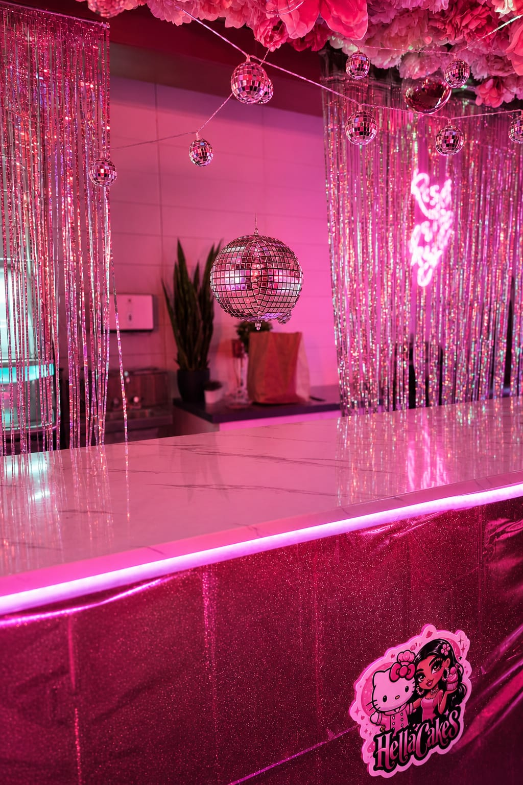 Sparkly pink bar with tinsel and disco ball